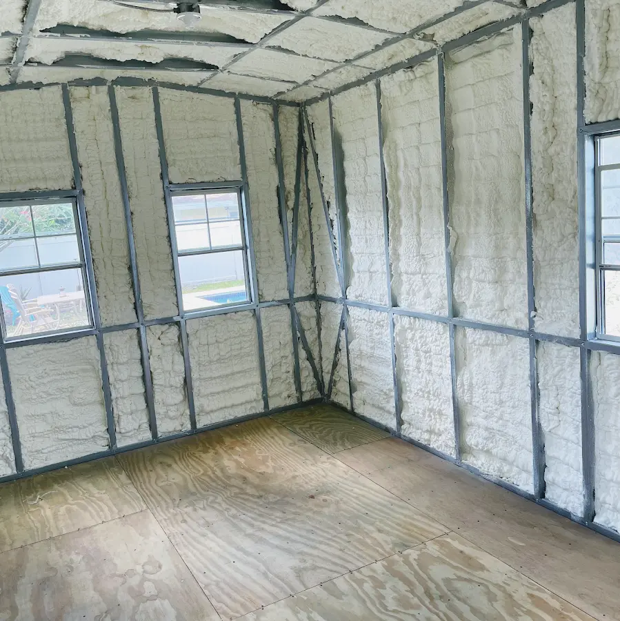 Closed-cell spray foam insulation applied to wall cavities in a residential project in Springfield
